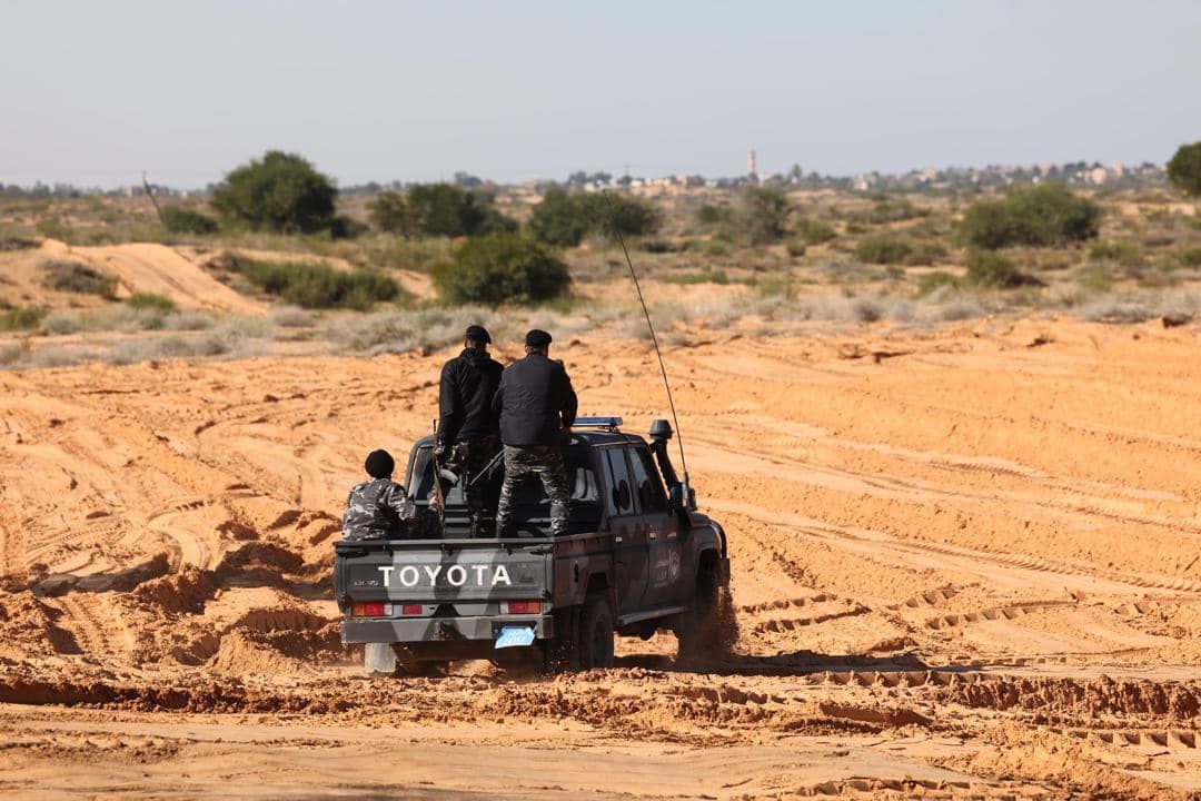 May be an image of 4 people and jeep